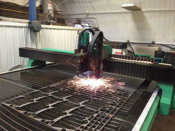 an automated CNC cutter processing materials